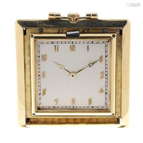 A travel clock by Vacheron Constantin. Yellow metal