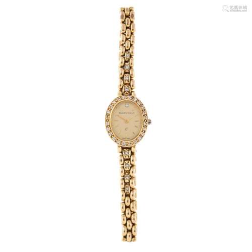 BUECHE-GIROD - a lady's bracelet watch. 9ct yellow gold