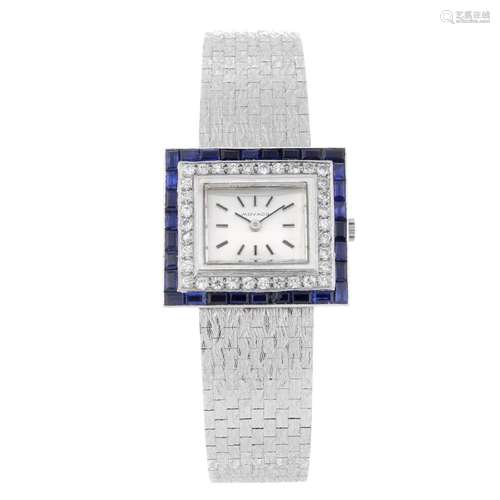 MOVADO - a lady's bracelet watch. White metal case with