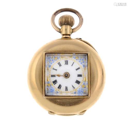 An open face pocket watch. Yellow metal case, stamped