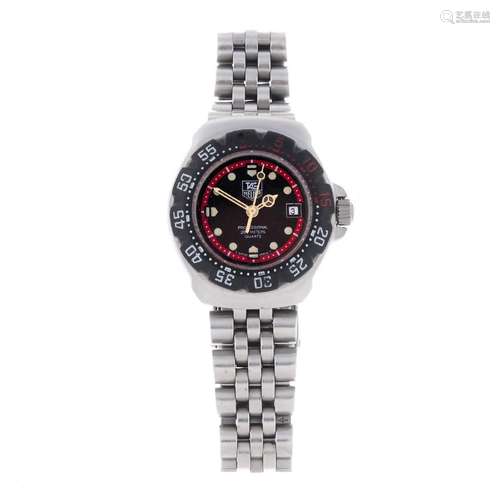 TAG HEUER - a lady's Formula 1 bracelet watch.