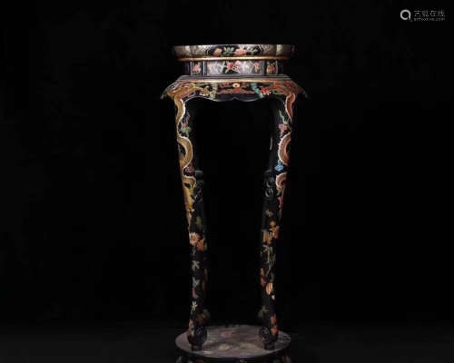 A LACQUER GILT PATTERN TABLE
