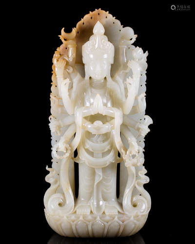 A HETIAN JADE CARVED GUANYIN FIGURE