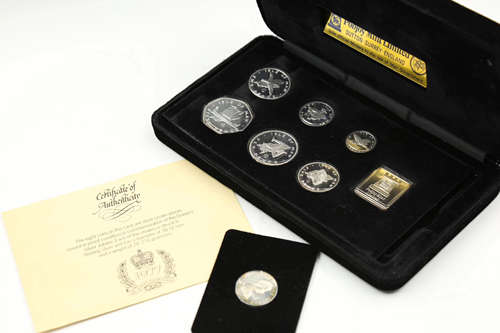 A SET OF 8 PIECES COMMEMORATIVE COINS