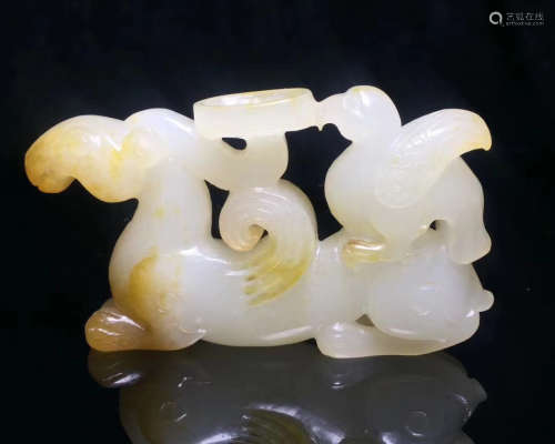 A HETIAN WHITE JADE CARVED LAMP STAND