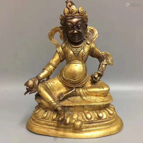 A GILT BRONZE BUDDHA FIGURE PENDANT