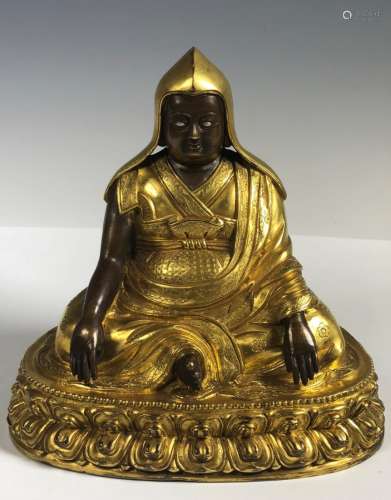 A Gilt Bronze Figure Of Buddha