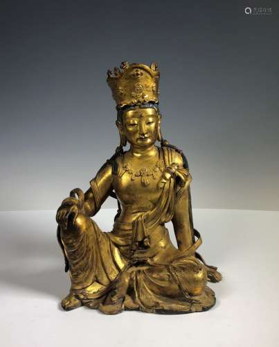 A Large Gilt Bronze Figure of Seated GuanYin