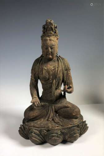 A Carved wood Figure Of Buddha