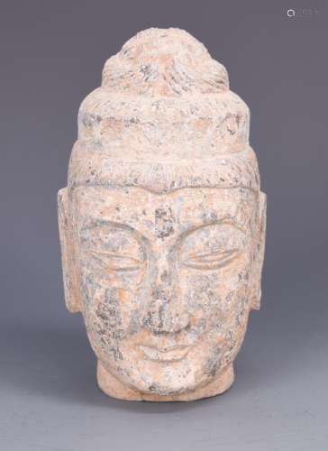 A Carved Stone Head Of Buddha