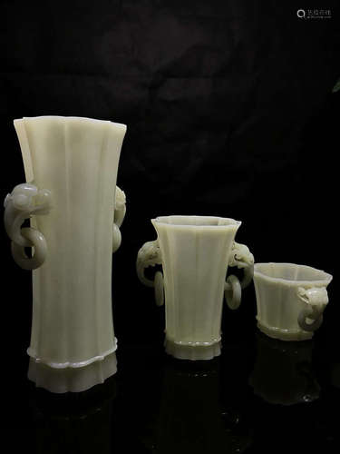 A SET OF HETIAN JADE BUBUGAOSHENG VASES