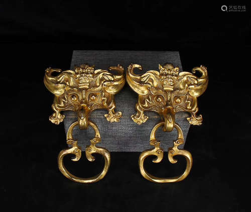 A PAIR OF GILT BRONZE DOOR KNOCKERS, QING DYNASTY