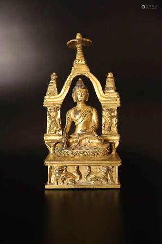 A QING BRONZE GILT SHIJIAMONI STATUE