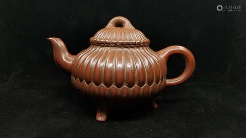 A GUJINGZHOU-WULINGYI MARK PURPLE CLAY TEAPOT WITH THREE FEET 400 CC