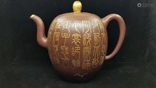 A PURPLE CLAY TEAPOT 750 CC