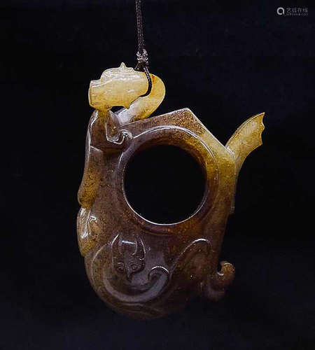 A RELIEF CHICKEN HEART SHAPED JADE PENDANT, XIHAN DYNASTY