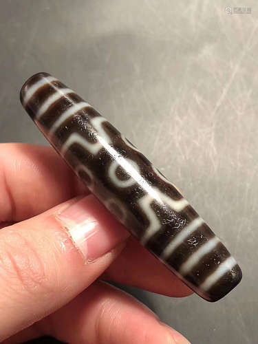 A SEVEN-EYE DZI BEAD