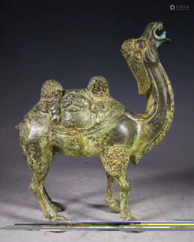 A BRONZE CARVED FIGURE OF CAMEL