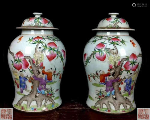 PAIR OF FAMILLE-ROSE JARS WITH QIANLONG MARK