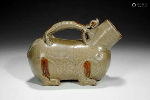 An olive green glazed lion-form vessel,Huzi
