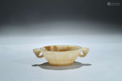 A jade carved 'lotus' washer