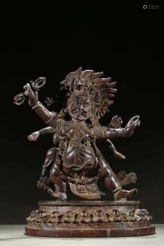 A rare aloeswood carved figure of Mahakala
