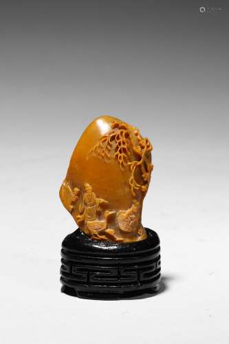 A Tianhuang carved 'elder and boy' boulder