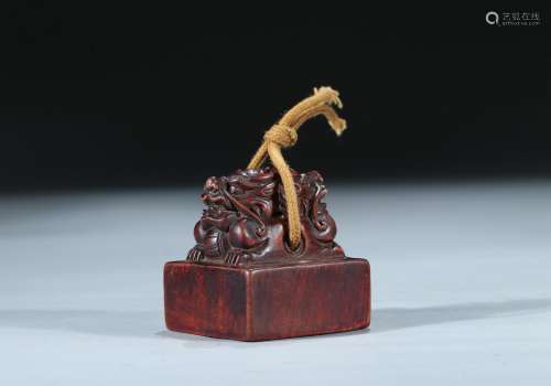 A sandalwood carved 'double beast' square seal