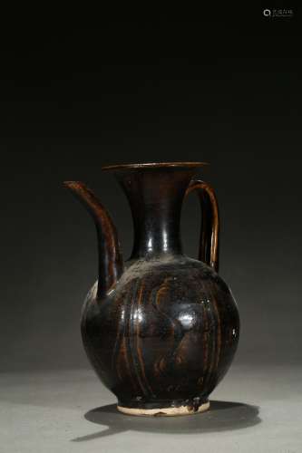 A brown glazed ewer