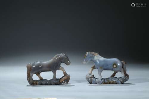 A pair of agate carved horses