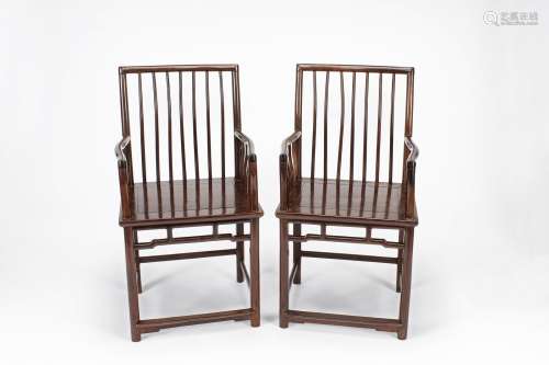A pair of ming style huanghuali armchairs