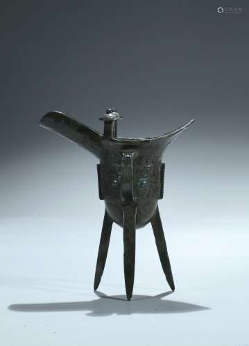 A bronze 'taotie' ritual jue vessel, Jue