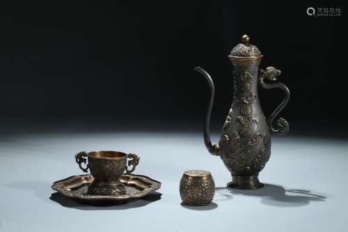 A set of four silver gilted teapot wares