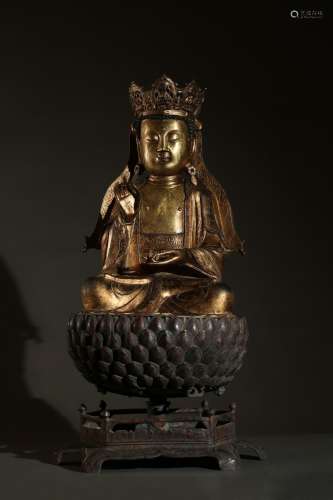 A large gilt bronze Shakyamuni on lotus base