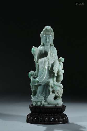 A jadeite carved figure of guanyin and dragon
