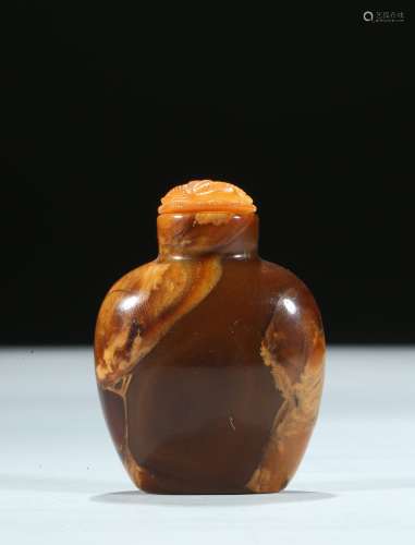 A mottled opaque root amber snuff bottle