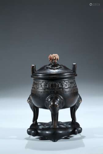 An agarwood carved tripod censer with zitan stand