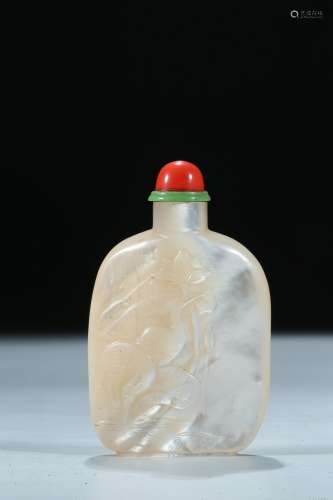 A mother-of-pearl carved snuff bottle