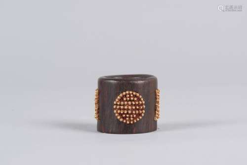 An agarwood carved 'gold-bead' archer's ring