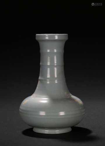 A celadon glazed vase
