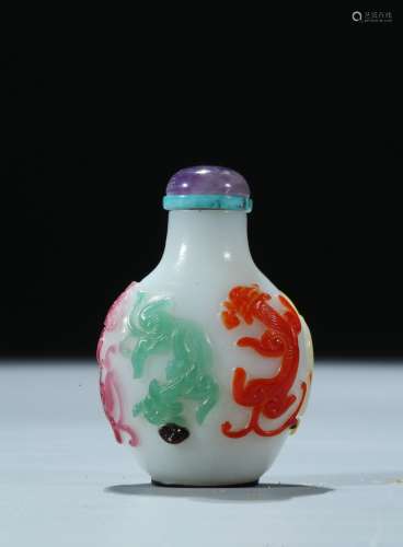 A five-color overlay glass 'chilong' snuff bottle