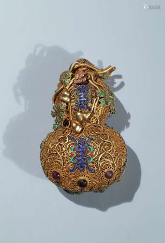 A gold wire enamelled and gems inlaid double gourd box