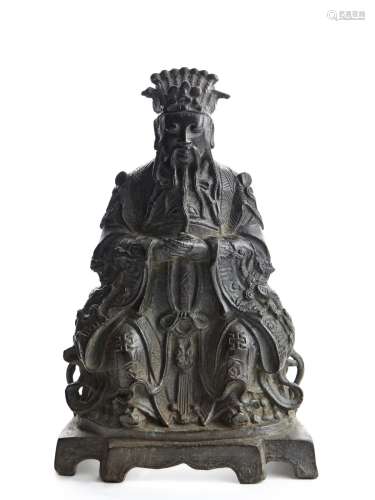 A bronze seated figure of Daoist immortal
