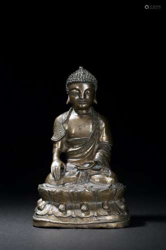 A bronze figure of Shakyamuni