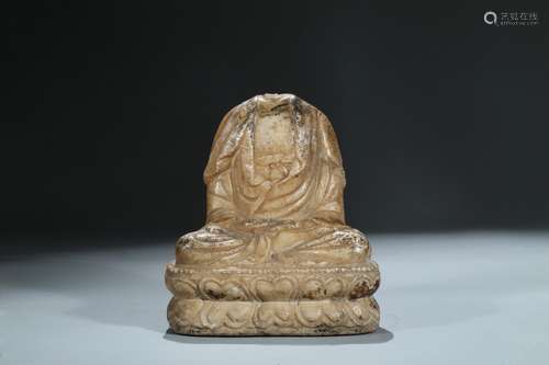 A marble carved figure of amitabha torso