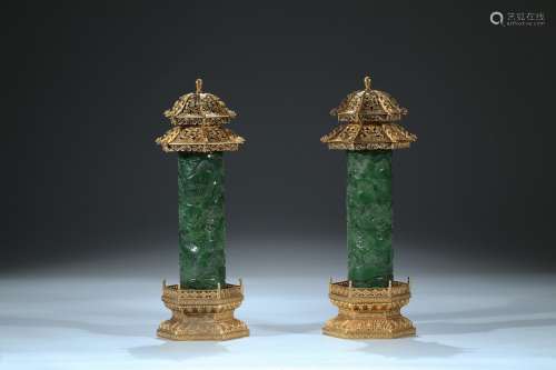 A pair of green jade pagoda form incense holders