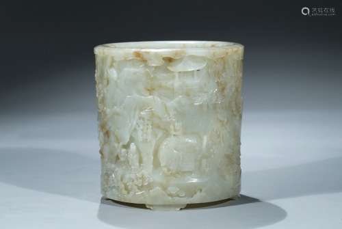 A large white jade carved 'elephant' cylindrical brushpot