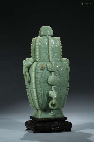 A magnificent greenish yellow jade archaistic vase