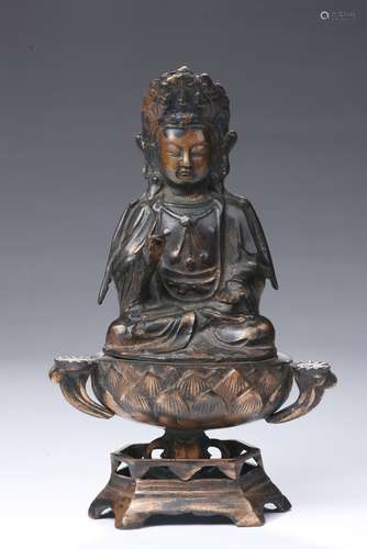 A bronze parcel gilt figure of Guanyin