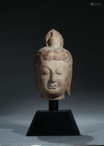 A white marble carved head of bodhisattva